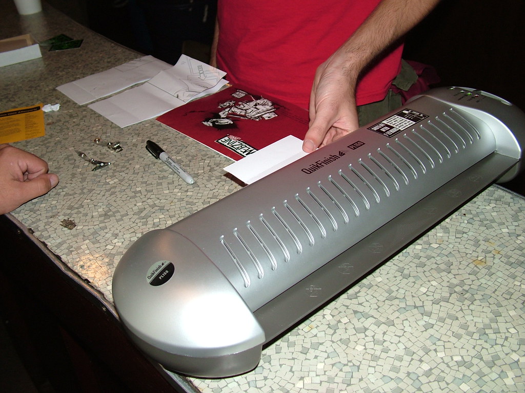 Illustrative photograph of a film lamination machine in use